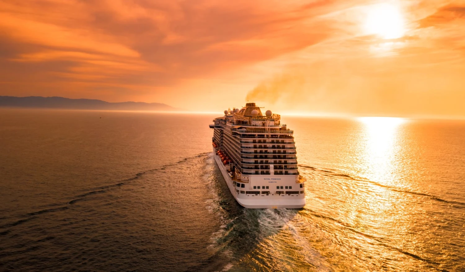 A cruise ship at sunset