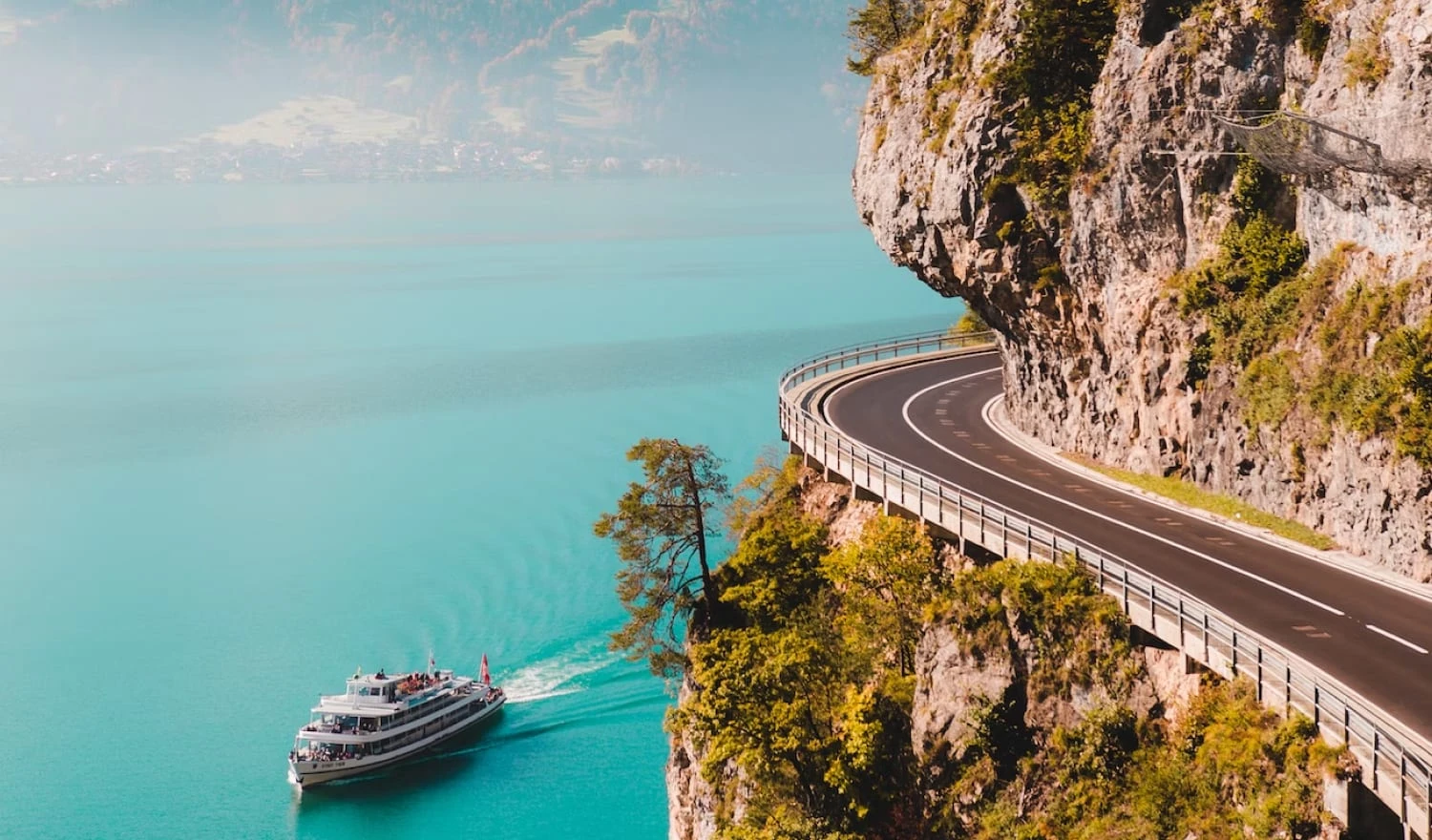 A cruise ship sailing on blue waters