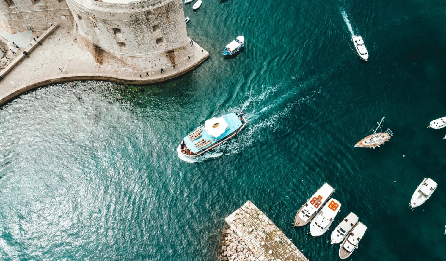 Boats leaving the harbour in Rovinj.