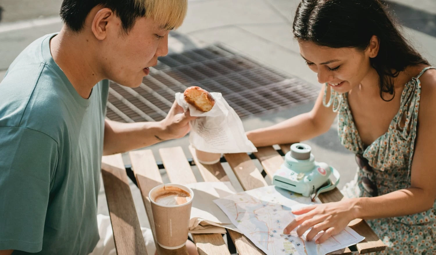 A happy couple investigating a map