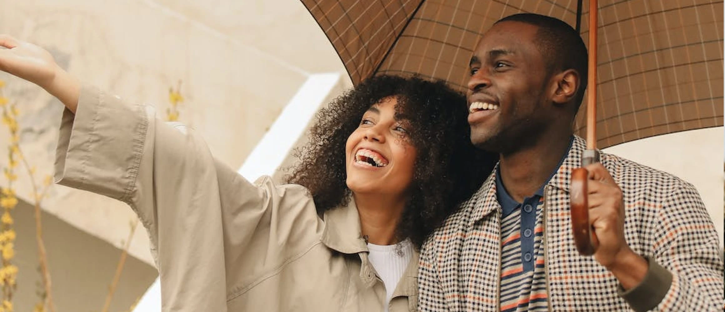 A couple happy in the rain