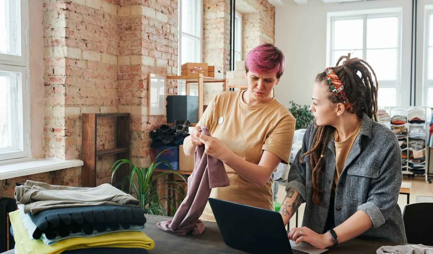 Two women taking inventory