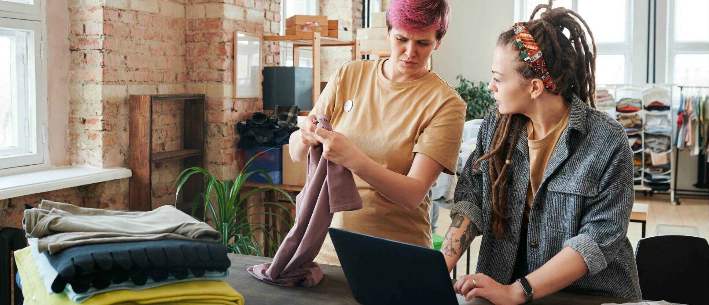 Two women taking inventory