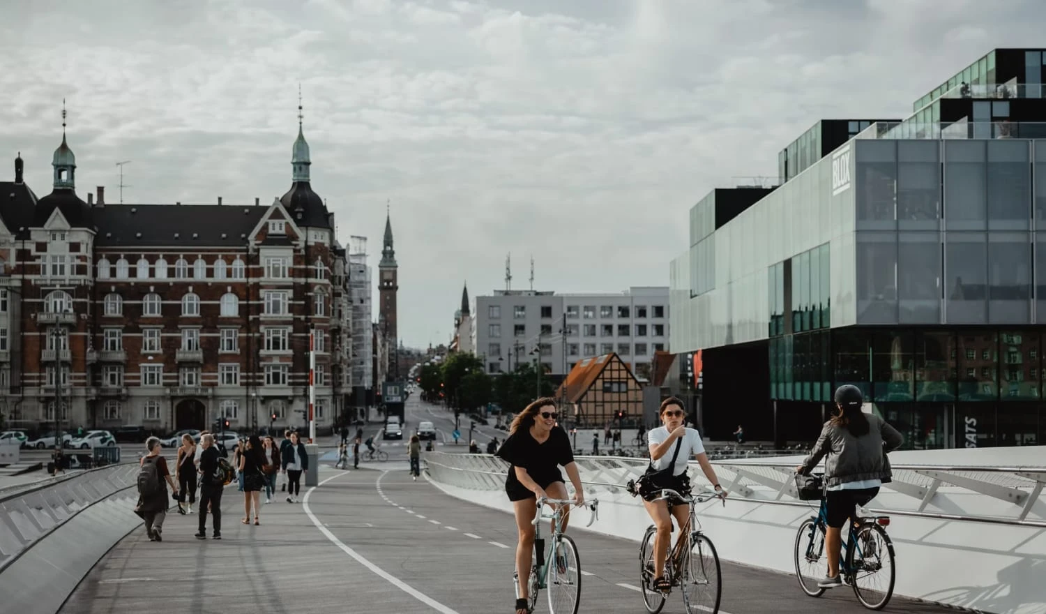 A couple riding bikes in Denmark