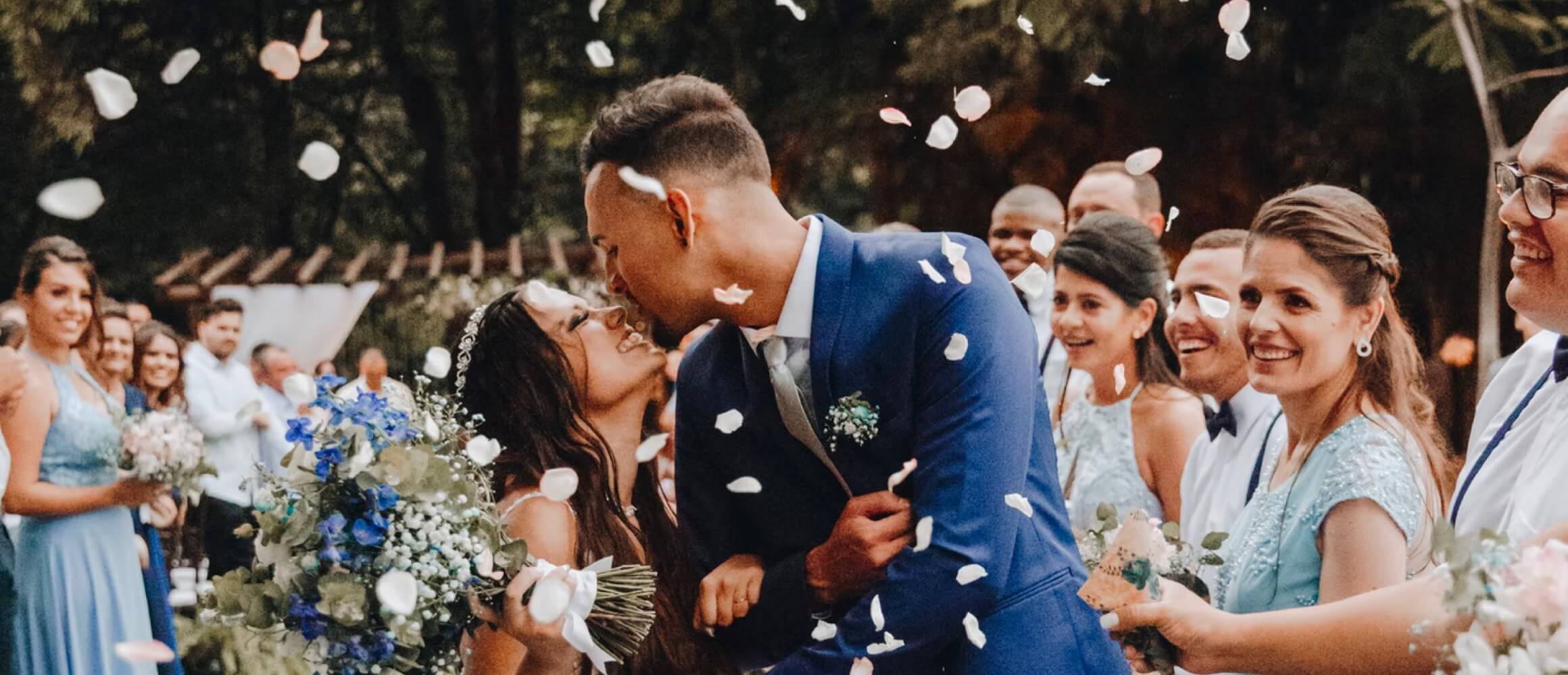 Kissing lovers walking down the isle