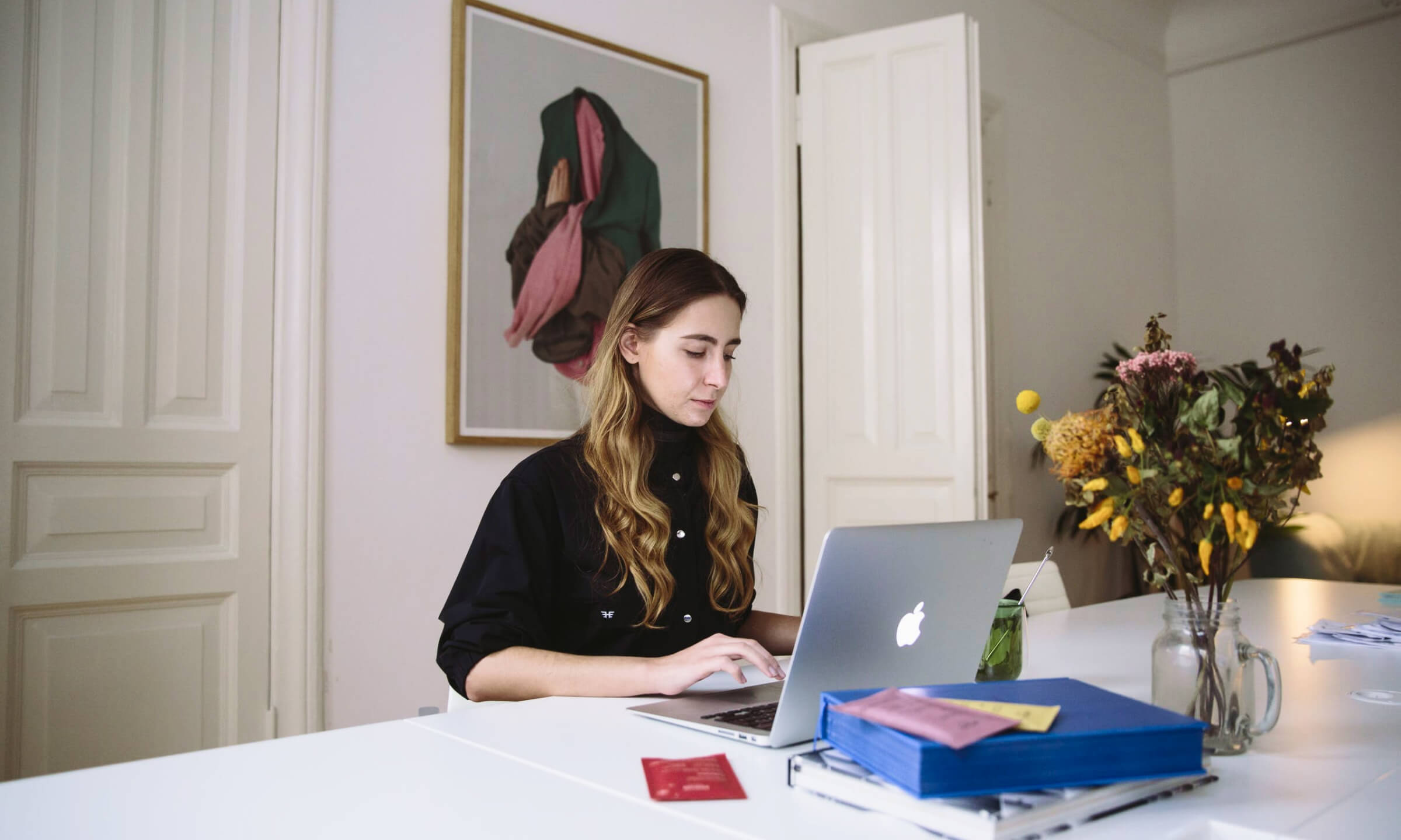 A woman typing on her device looking frustrated