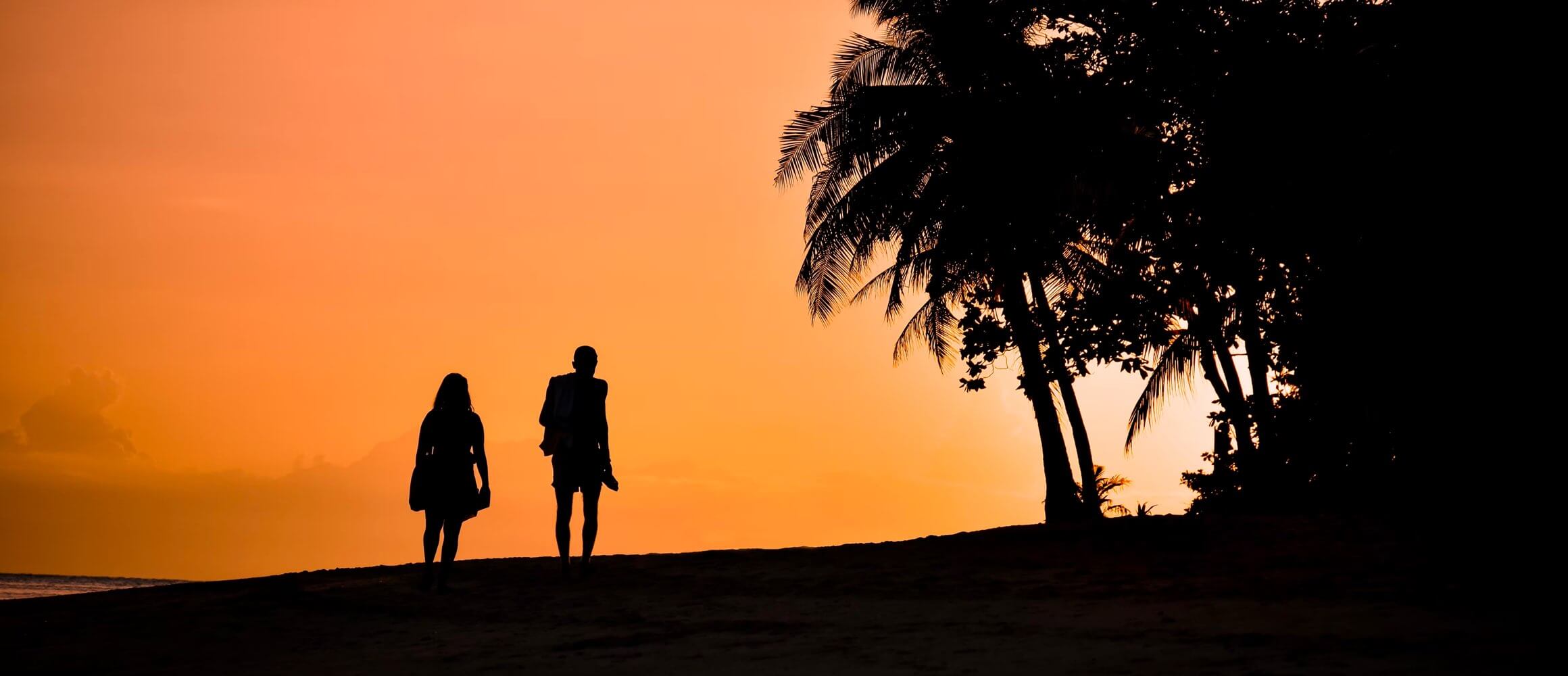 Outline of a couple at sunset