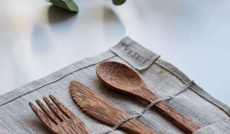 Eco-friendly tableware in a leafy backdrop