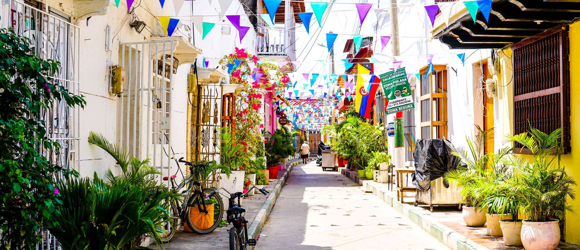 Colorful street decorations in a lively area of Colombia