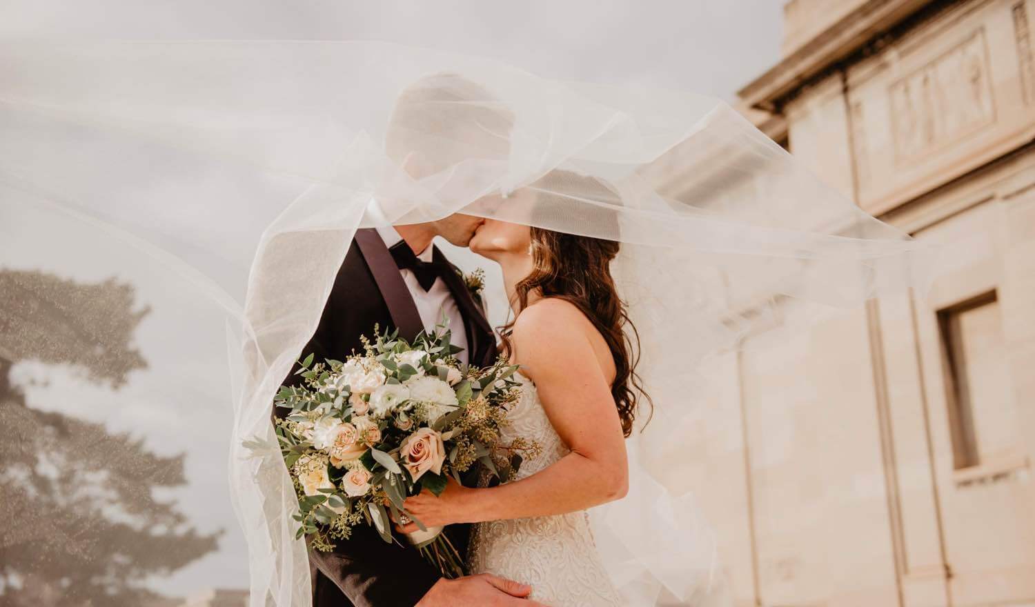 A couple who have just been married kissing