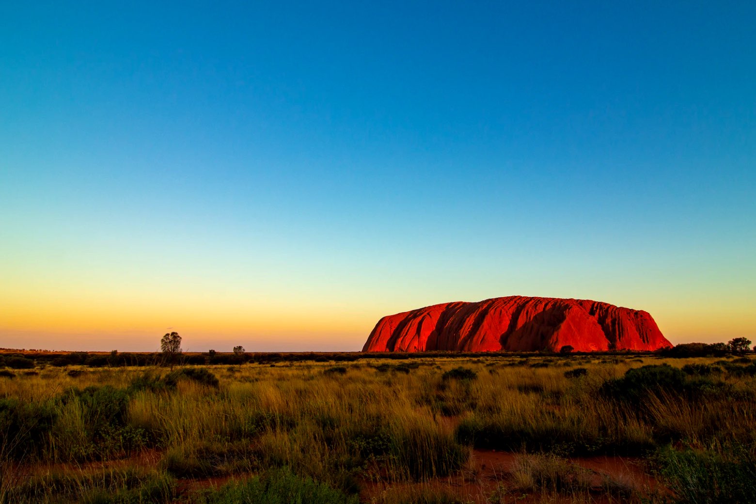 The red rock glistening at sunset