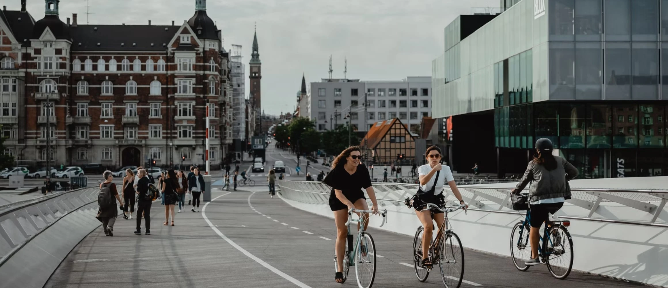 A couple riding bikes in Denmark