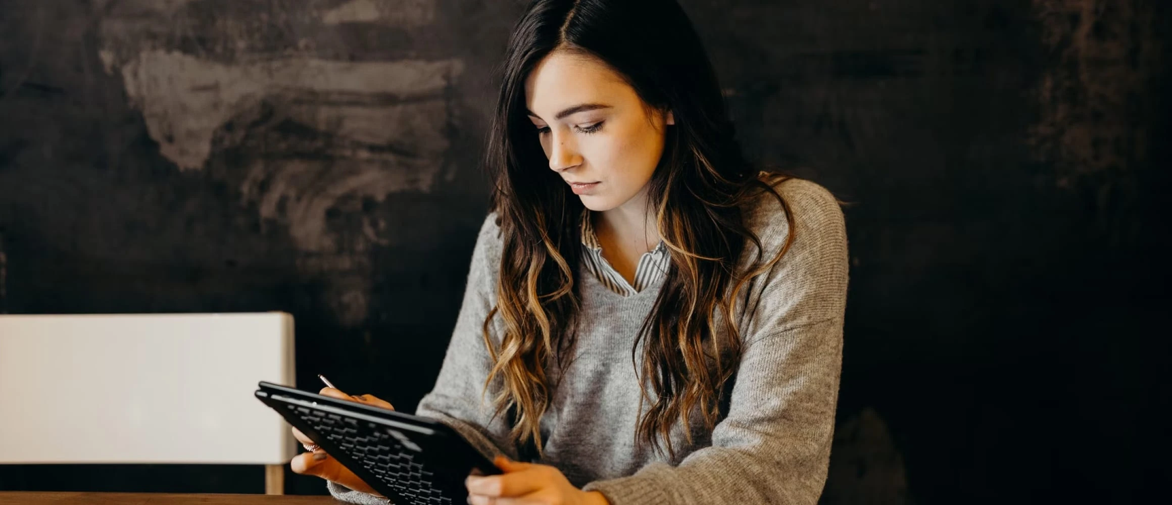 A bride looking at her tablet