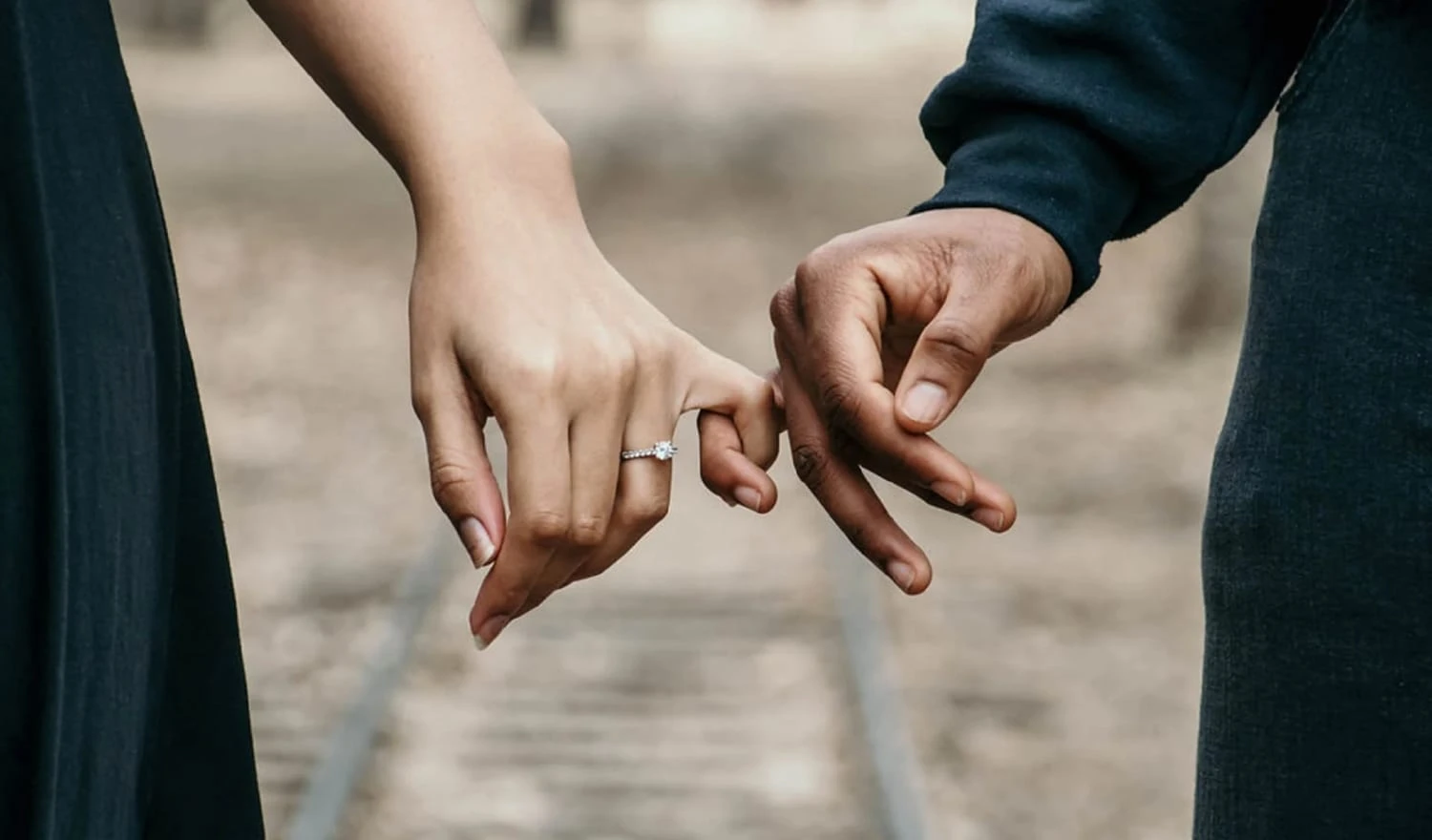 Couple holding hands