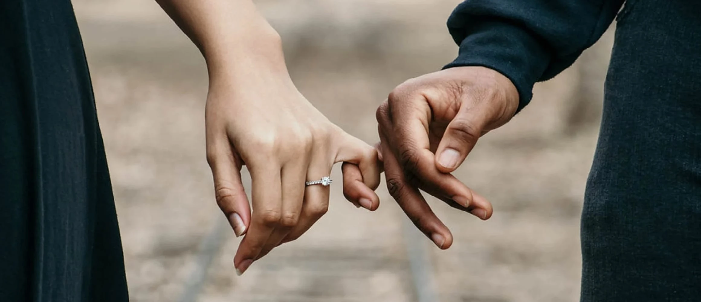 Couple holding hands