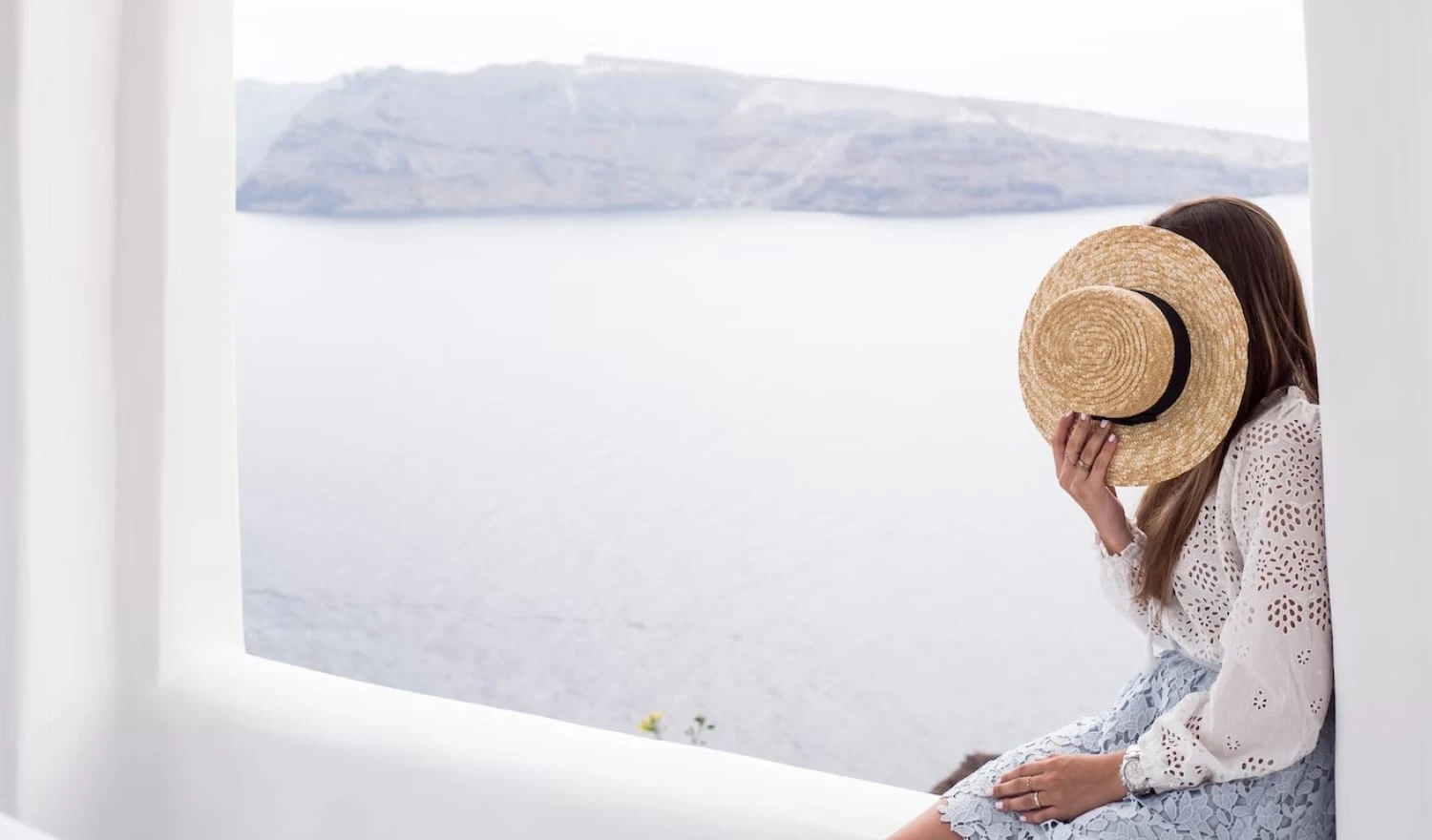 A woman hiding her face